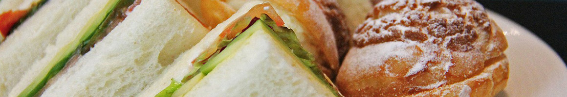 Eating Mediterranean Middle Eastern Sandwich at La Pita restaurant in Dearborn, MI.